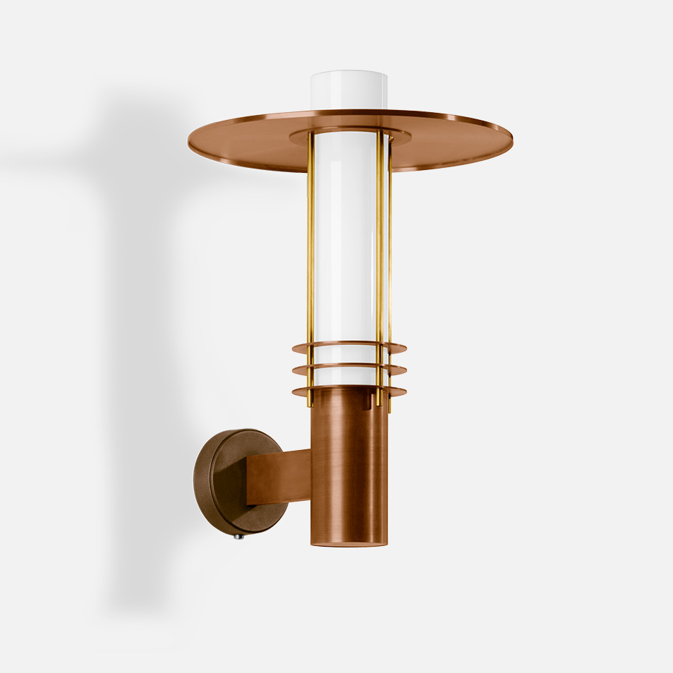 Cast bronze and copper wall luminaire
