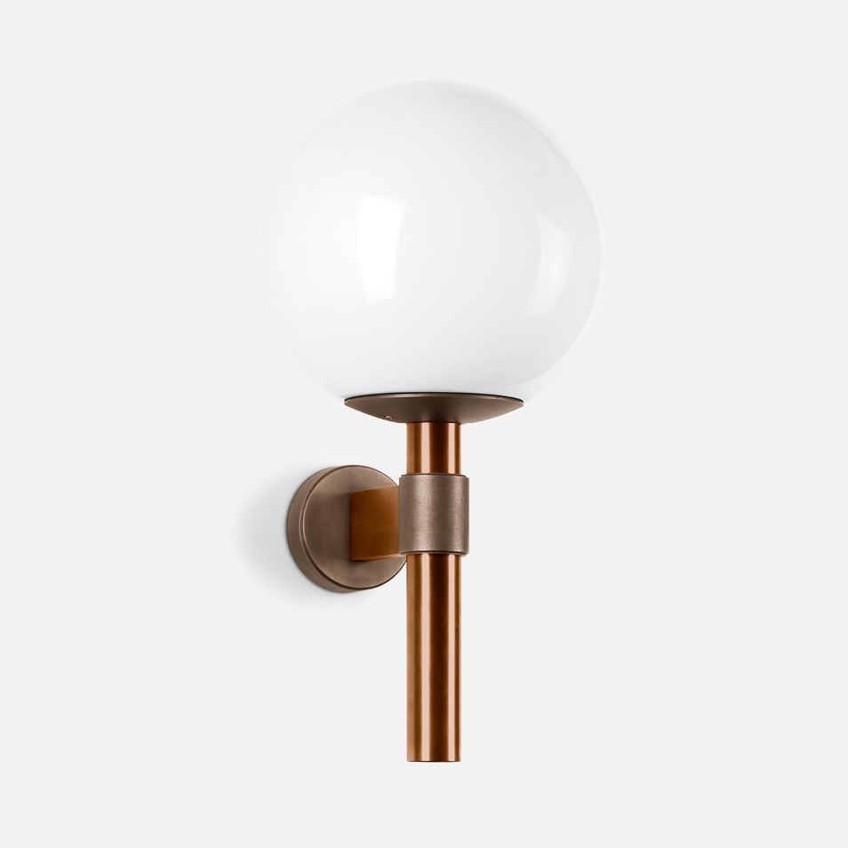 Cast bronze and copper wall luminaire