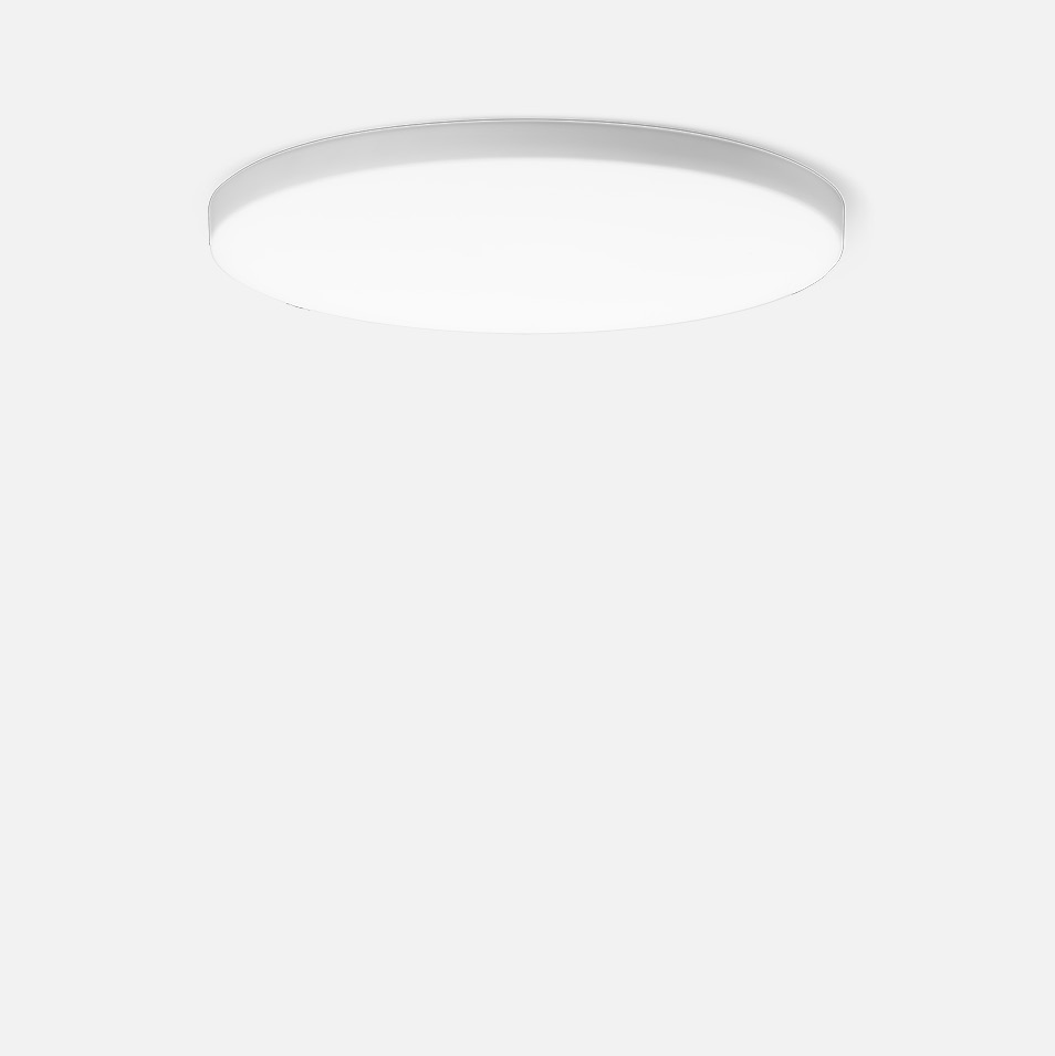 Semi-recessed ceiling and wall luminaire
